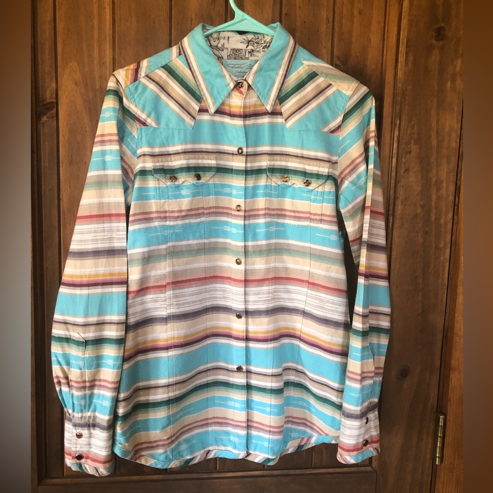 Tasha Polizzi Colt 44 top.